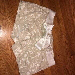 Express beige print dress shorts